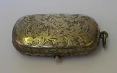 Appraisal: AN EDWARDIAN SOVEREIGN HOLDER maker Constantine Floyd Ltd Birmingham of