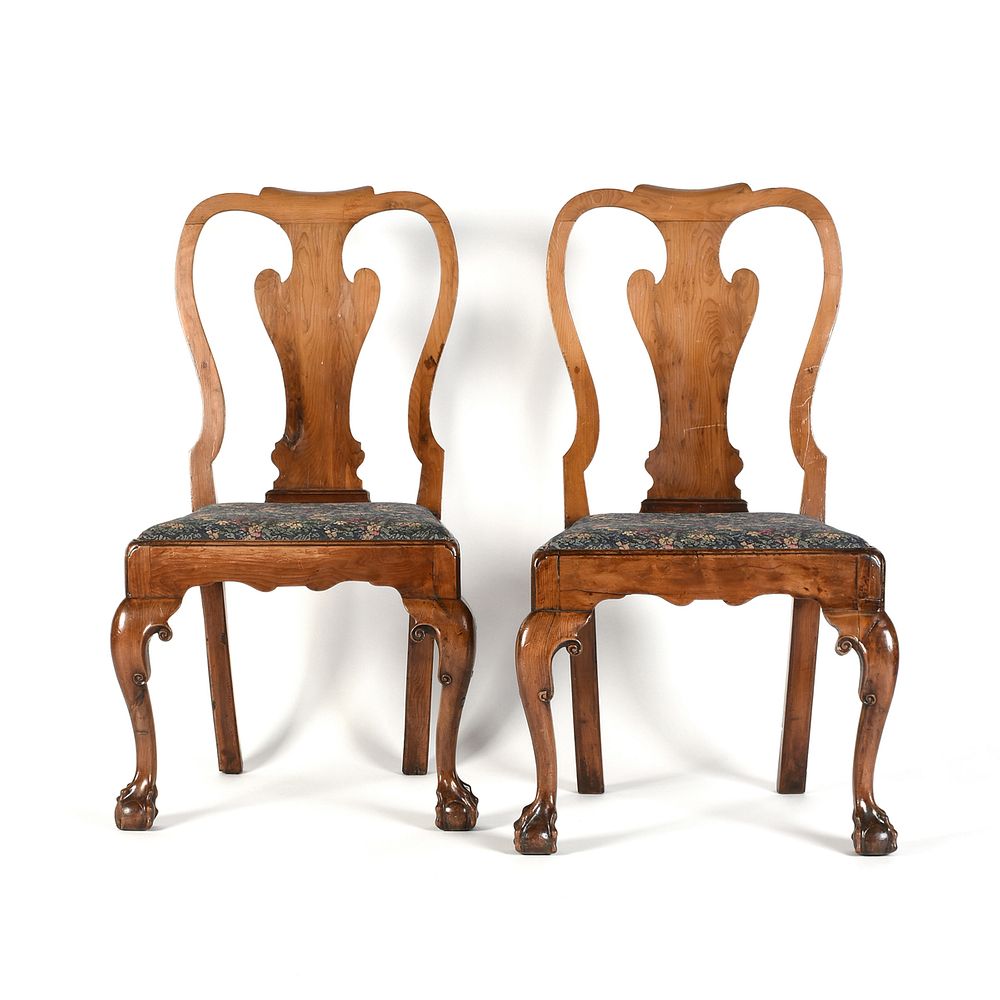 Appraisal: A PAIR OF GEORGE I CARVED YEW CHAIRS CIRCA A