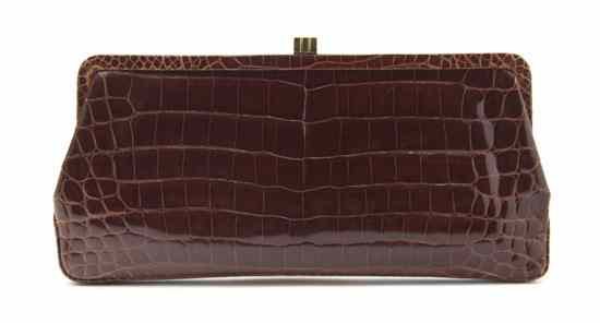 Appraisal: A Lambertson Truex Brown Patent Crocodile Clutch goldtone hardware light