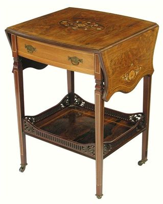 Appraisal: A late Victorian rosewood and marquetry occasional table with stringing