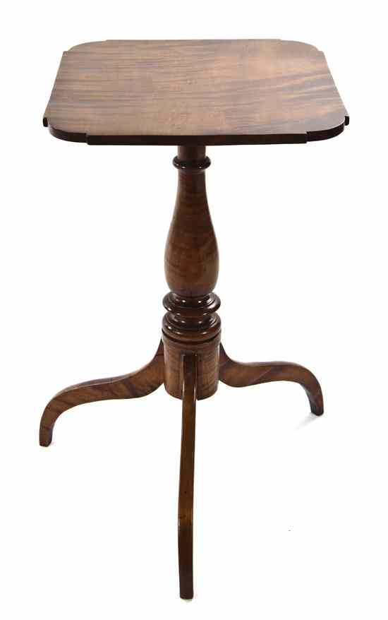 Appraisal: An American Maple Pedestal Table having a rectangular top with