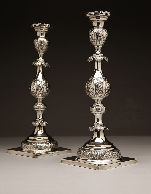 Appraisal: A pair of Russian silver candlesticks A pair of Russian