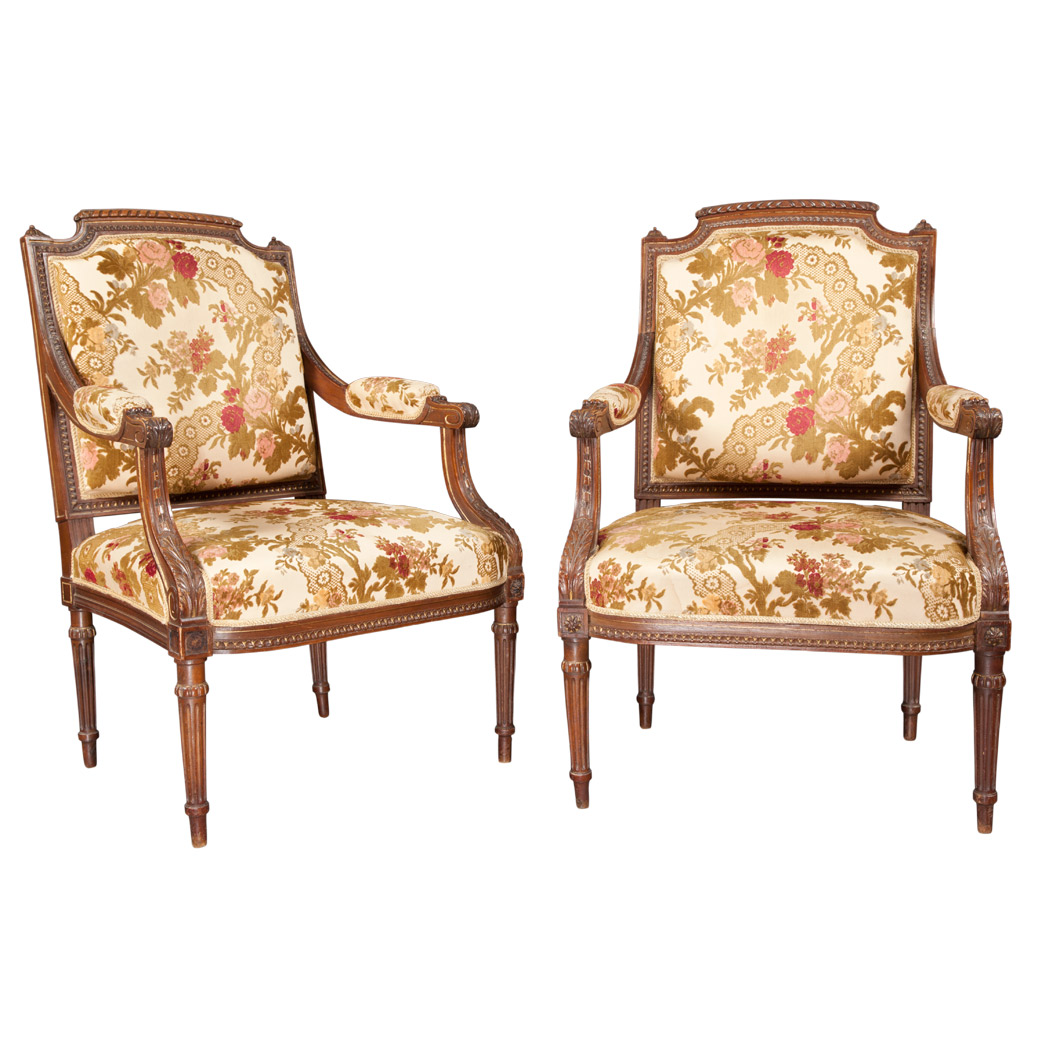 Appraisal: Pair of Louis XVI Style Carved Mahogany Fauteuils Each arched