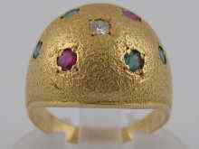 Appraisal: A French hallmarked carat gold bombe ring set with rubies