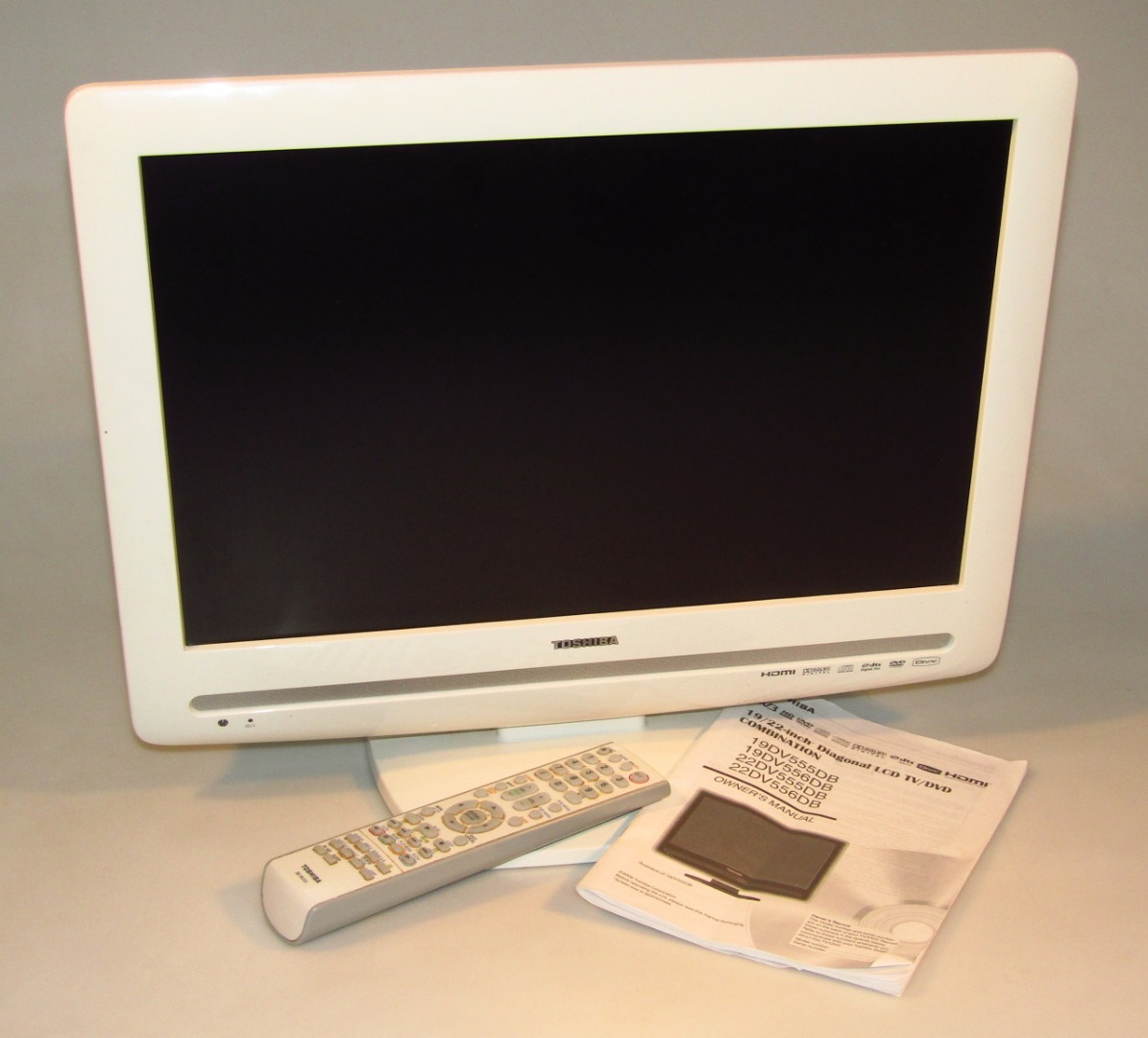 Appraisal: A Toshiba diagonal LCD TV DVD combination in white trim