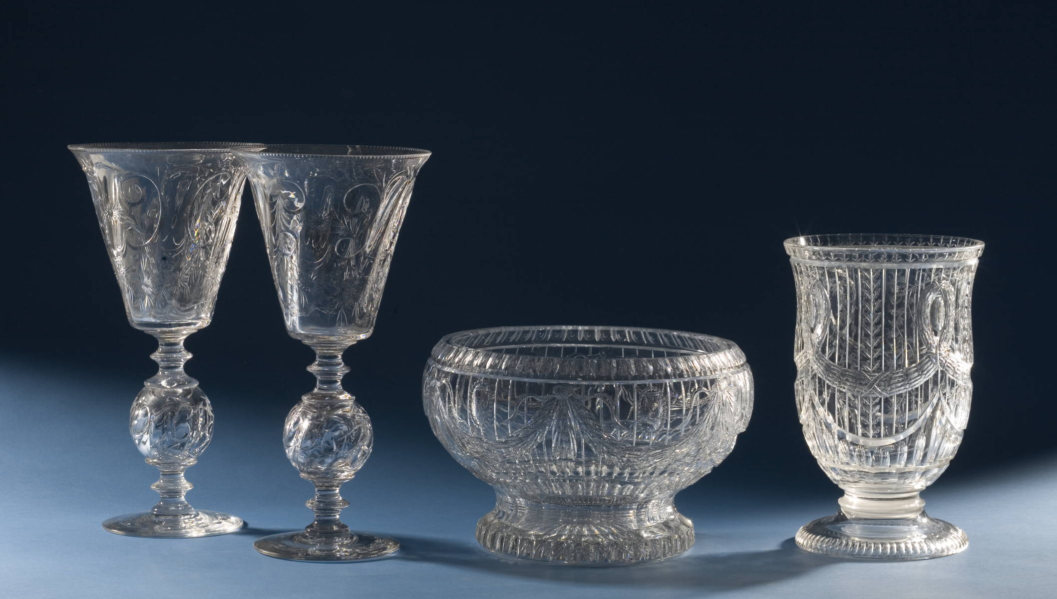 Appraisal: PAIR OF BLOWN AND ENGRAVED MONUMENTAL CEREMONIAL FOOTED GOBLETS A