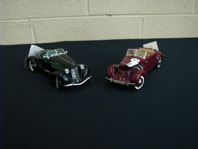 Appraisal: Two Franklin Mint Precision Model Cars including Auburn boattail speedster