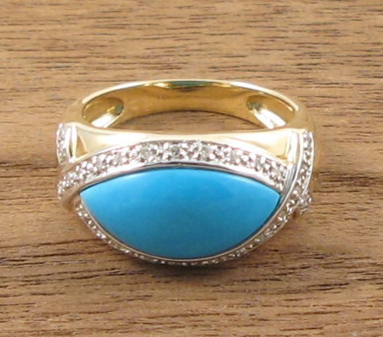 Appraisal: TURQUOISE AND FOURTEEN KARAT GOLD RING The yellow and white