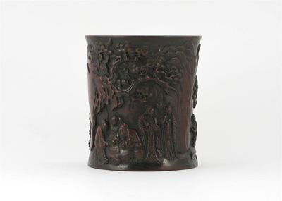 Appraisal: A Chinese hardwood brushpot carved with figures playing Go and