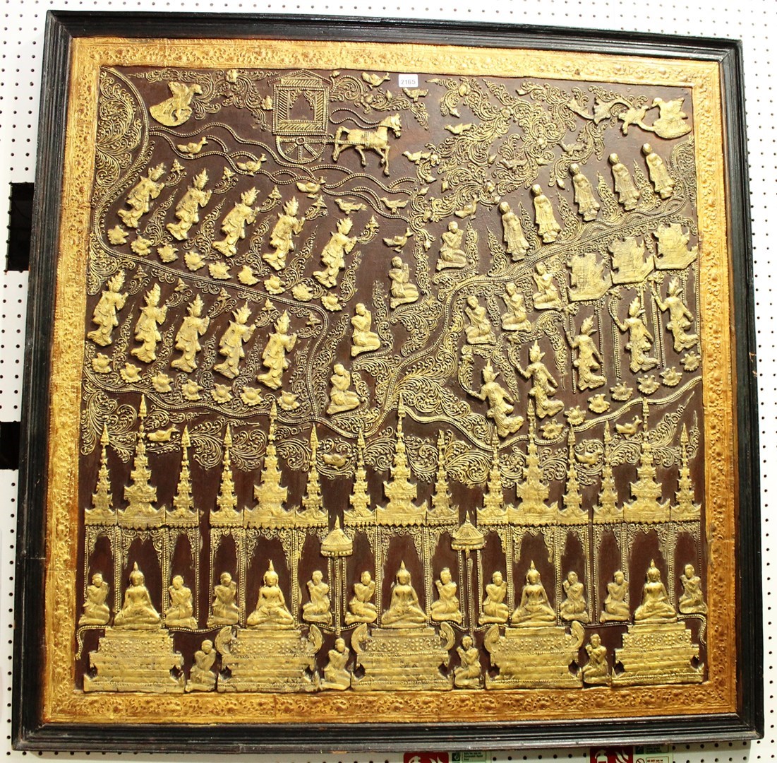 Appraisal: A large Thai wood panel decorated in relief and gilt