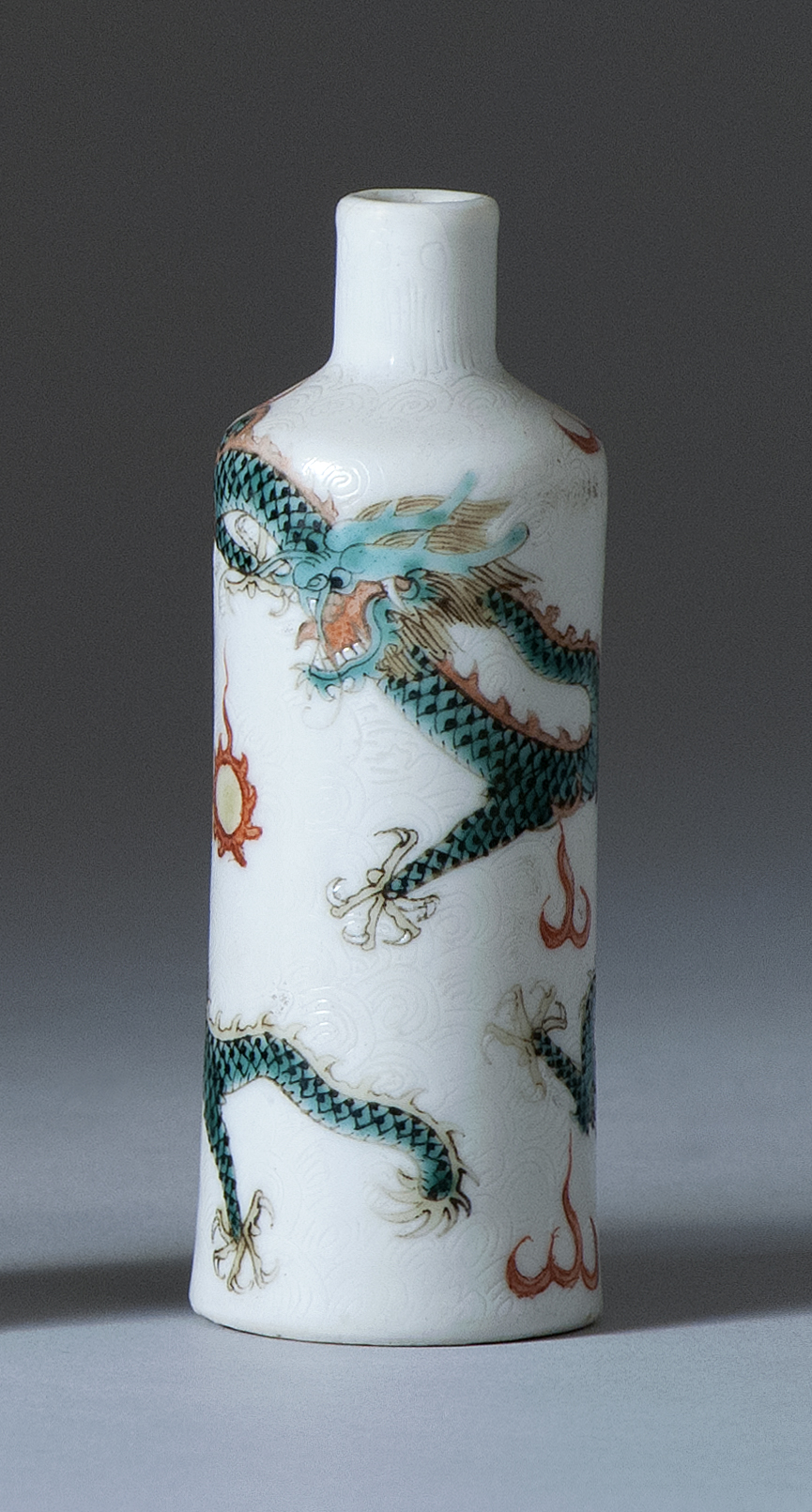 Appraisal: PORCELAIN SNUFF BOTTLE Early th CenturyIn cylindrical form with five-claw