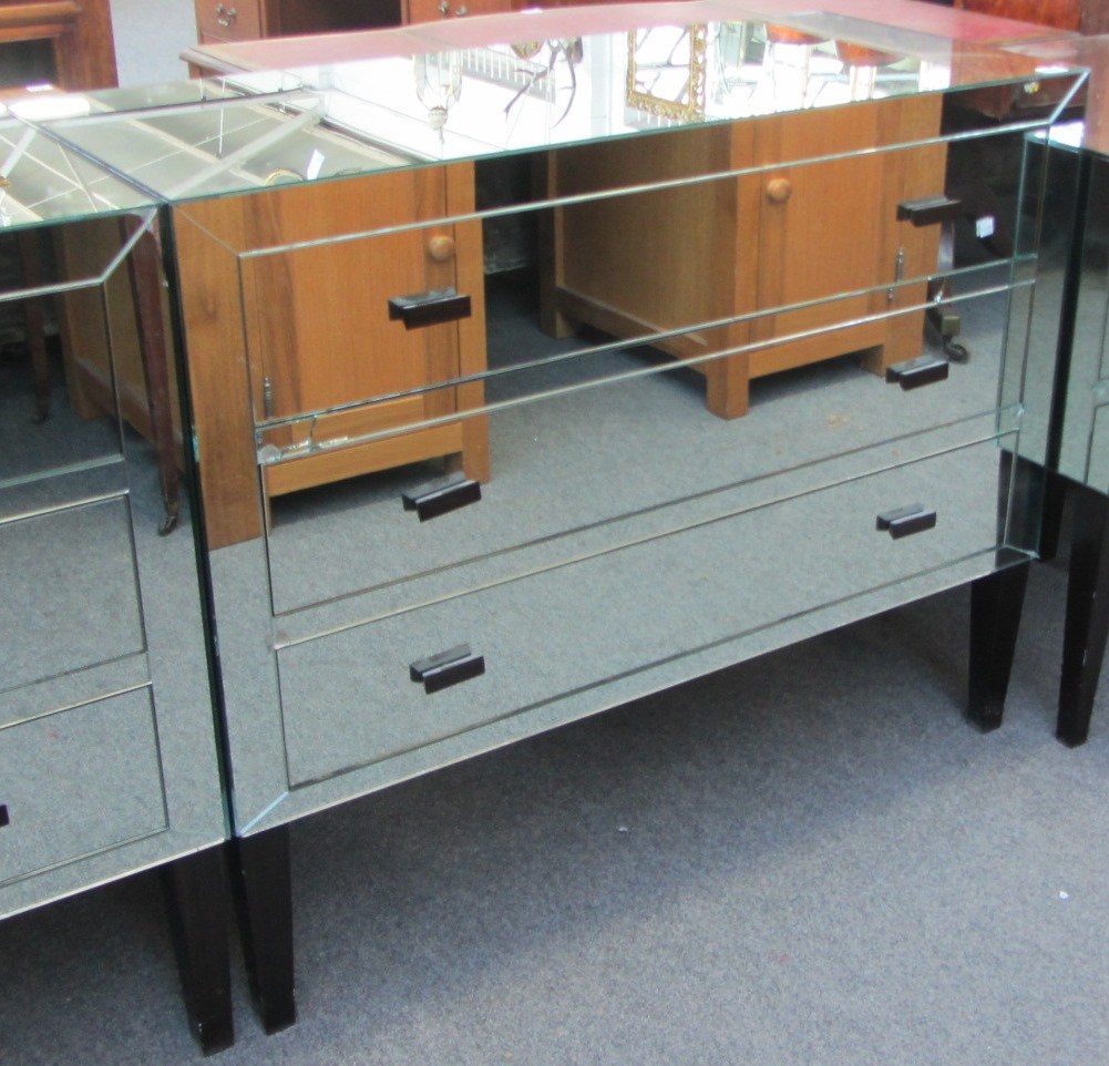 Appraisal: A th century mirrored glass 'Brighton' chest of three long