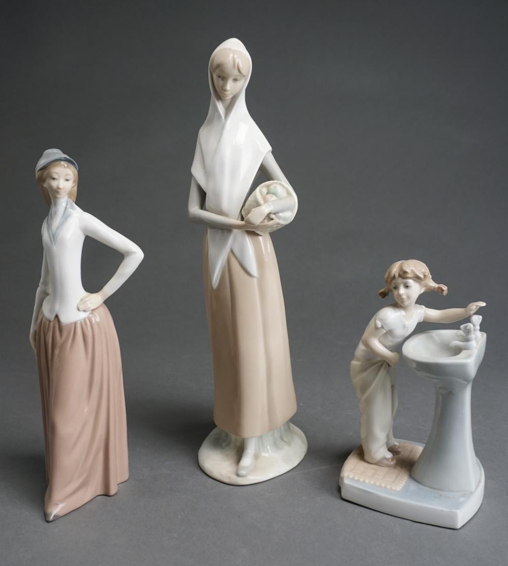 Appraisal: THREE SPANISH PORCELAIN FIGURES H OF TALLEST IN CM Three