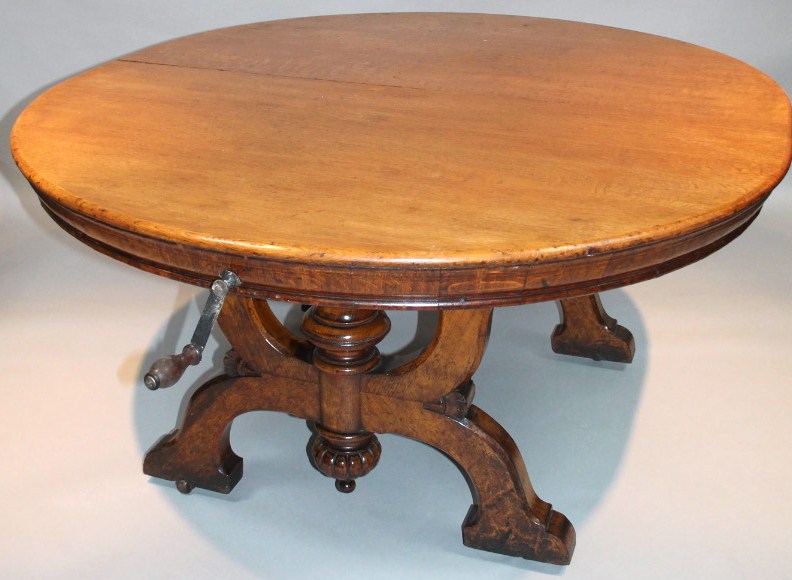 Appraisal: A thC oak D-end wind out dining table the plain