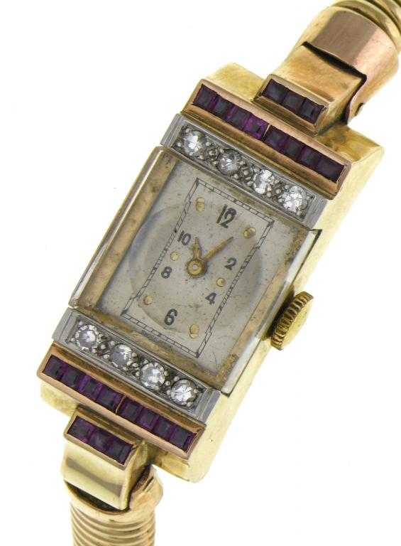 Appraisal: A RUBY AND DIAMOND COCKTAIL WATCH the geometric case with