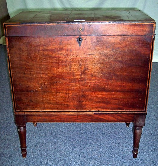 Appraisal: A George III mahogany cellaret the front and hinged cover