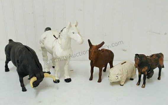 Appraisal: Group include cast iron coin banks - a Fighting Bull