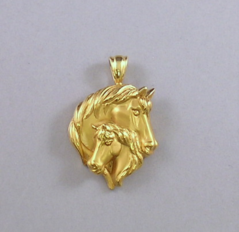 Appraisal: kt Gold Pendant Depicting a Horse and Her Foal