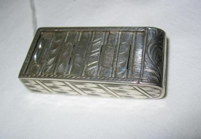 Appraisal: A VICTORIAN SNUFF BOX of oblong form with rounded end