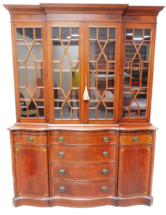 Appraisal: th C Georgian style two-piece breakfront display cabinet mahogany projecting