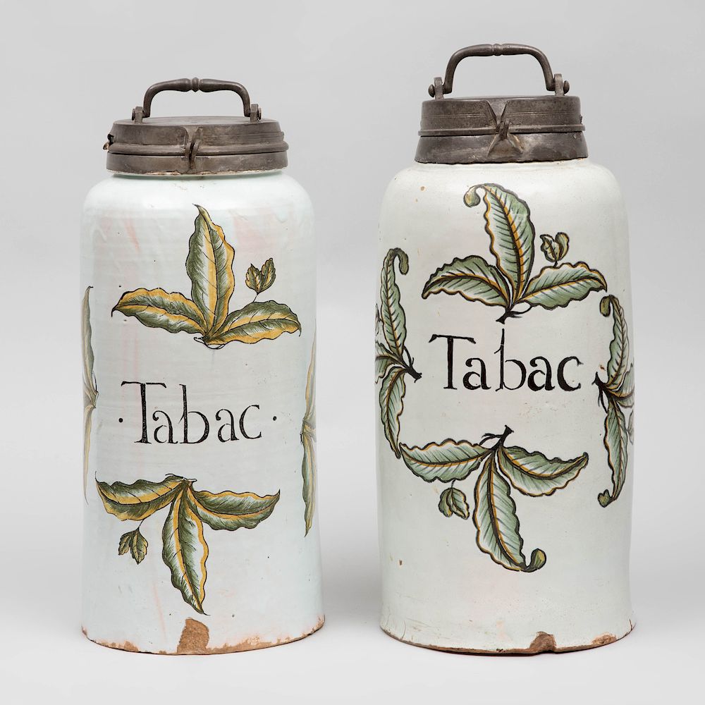 Appraisal: Pair of French Faience Tobacco Jars with Pewter Covers The