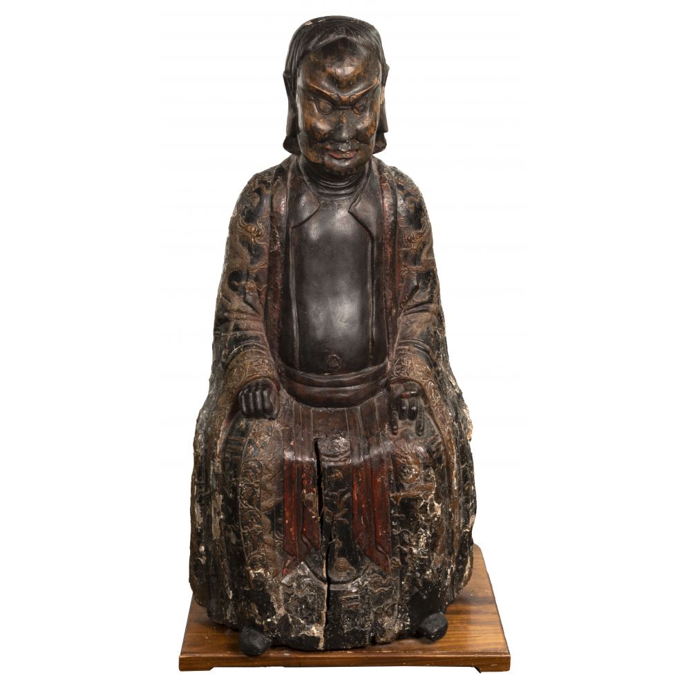 Appraisal: CHINESE MING STYLE DAOIST IMMORTAL WOOD FIGUREProtective guardian seated on