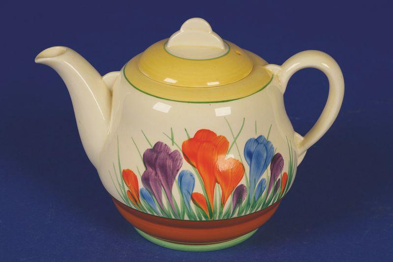 Appraisal: A CLARICE CLIFF TEAPOT decorated with the Crocus pattern printed