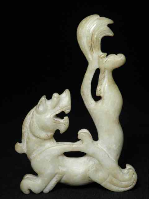 Appraisal: Chinese carved stone figure of a dragon creamy white in