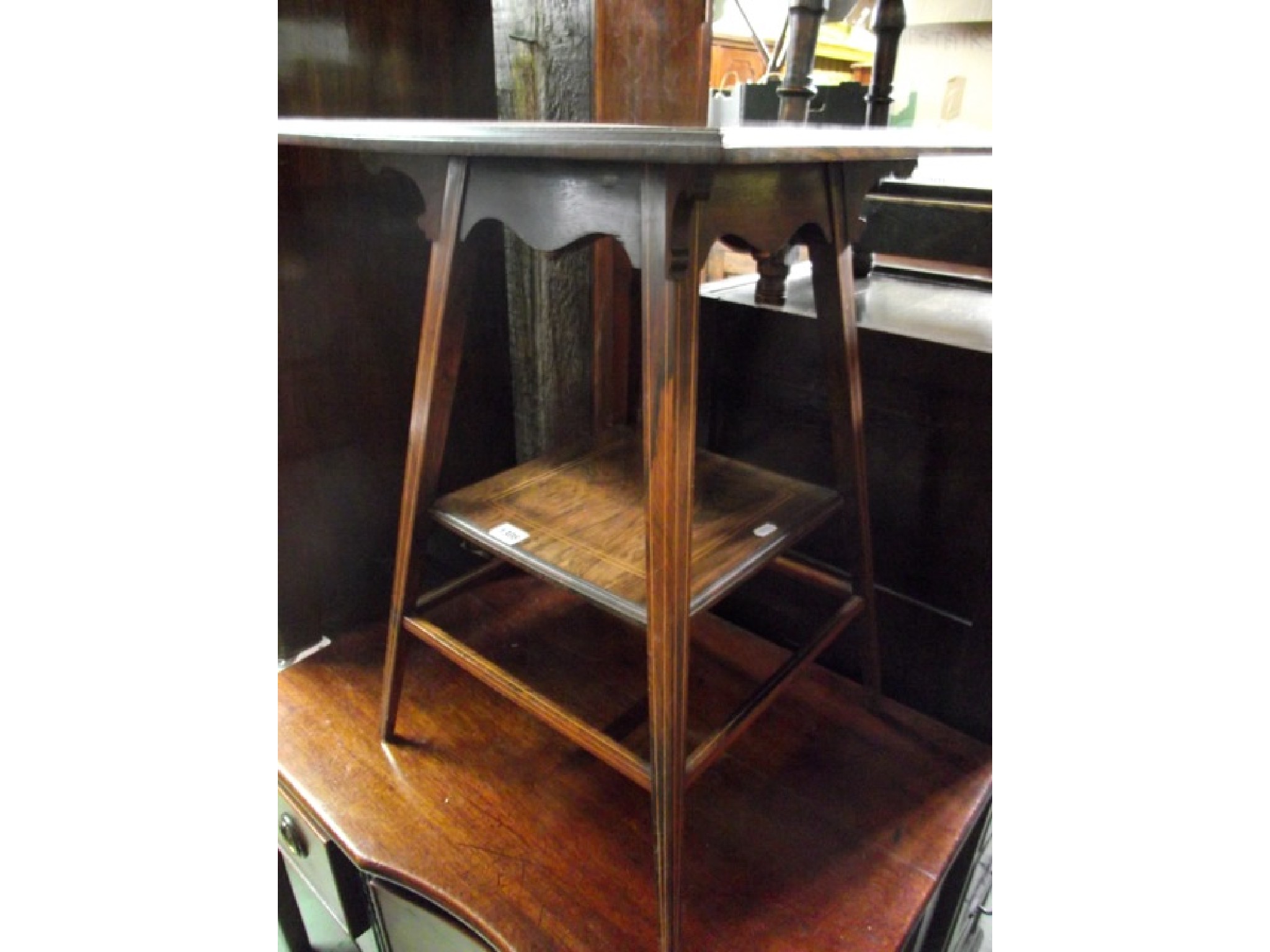 Appraisal: A good quality inlaid Edwardian rosewood two tier occasional table