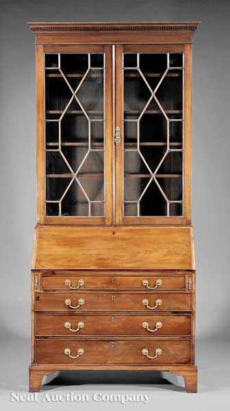 Appraisal: An Antique George III-Style Mahogany Bureau Bookcase th c dentil