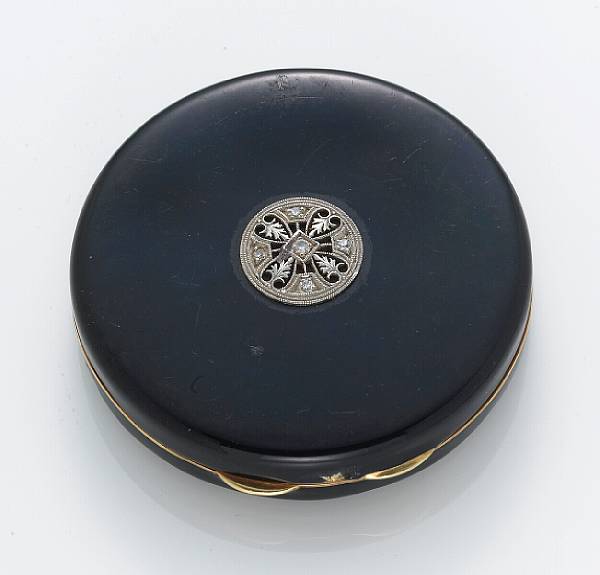 Appraisal: An enamel diamond platinum and k gold compact opening to