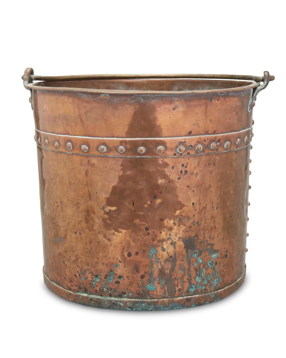 Appraisal: A hammered and hand-riveted copper and brass bucket th Century