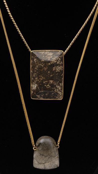 Appraisal: TWO STONE PENDANTS ON CHAINS Provenance Property from the Collection