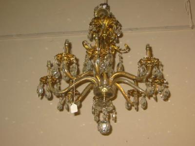 Appraisal: A PAIR OF CUT GLASS AND GILT METAL CHANDELIERS each