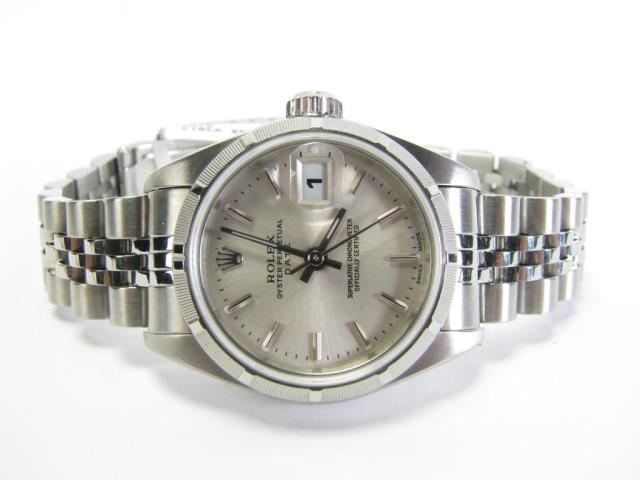 Appraisal: A lady's stainless steel Rolex watch with white stick dial