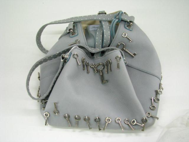 Appraisal: Lavini Bettina light blue leather duffle style hand bag with