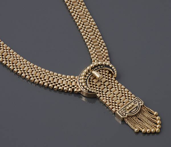 Appraisal: A gold link necklace with tassel g length in