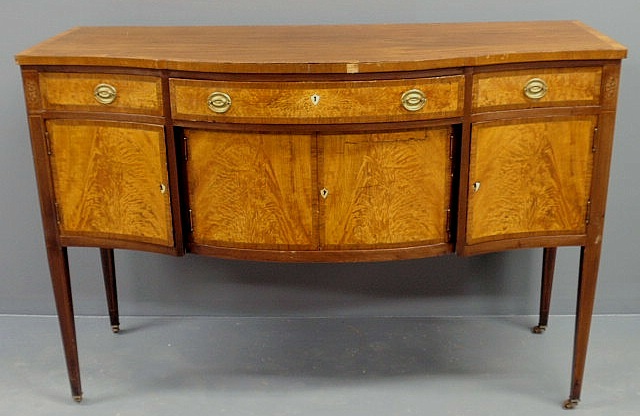 Appraisal: Hepplewhite style inlaid satinwood and mahogany sideboard with a serpentine