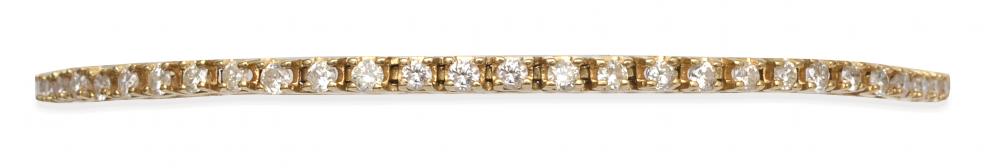 Appraisal: A DIAMOND LINE BRACELET Featuring fifty five round brilliant cut