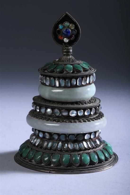 Appraisal: TIBETAN EMBELLISHED SILVER TWO-TIER BOX AND COVER Inset with two