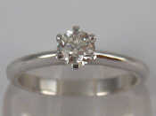 Appraisal: A white metal tests carat gold diamond solitaire ring the