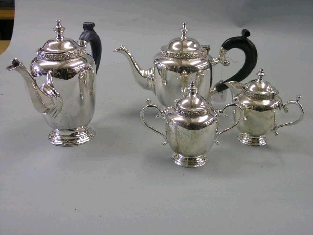 Appraisal: A silver plated tea set consisting of teapot hot water