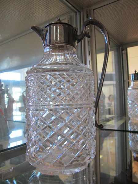 Appraisal: SILVER PLATE MOUNTED CUT CRYSTAL JUG