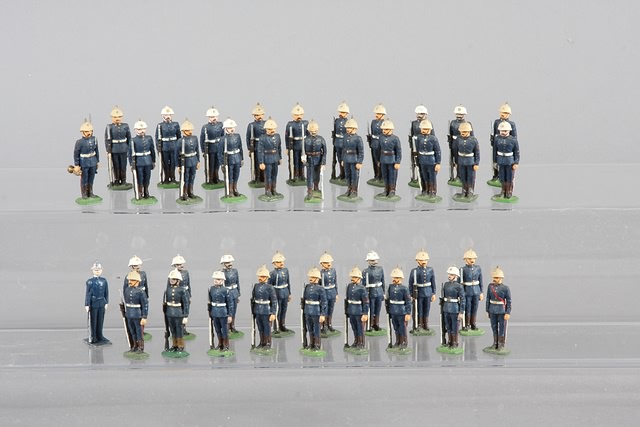 Appraisal: Lot of metal figures by Erickson representing British Royal Marines