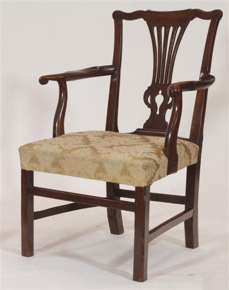 Appraisal: A country Chippendale birch armchair the serpentine top-rail over pierced