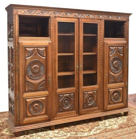 Appraisal: French Breton carved oak bookcase early thc having a molded