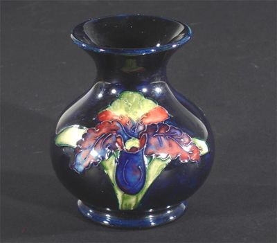 Appraisal: Frilled Orchid' a Moocroft Pottery vase designed by William Moorcroft