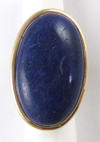 Appraisal: LAPIS LAZULI AND FOURTEEN KARAT GOLD RING set with a