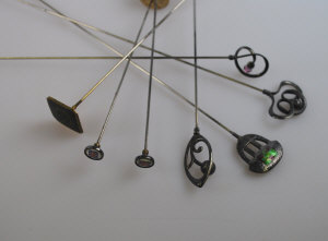 Appraisal: Collection of hat pins including Arts Crafts oxidised silver and