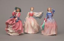 Appraisal: Grouping of Three Royal Doulton Figurines This grouping includes three